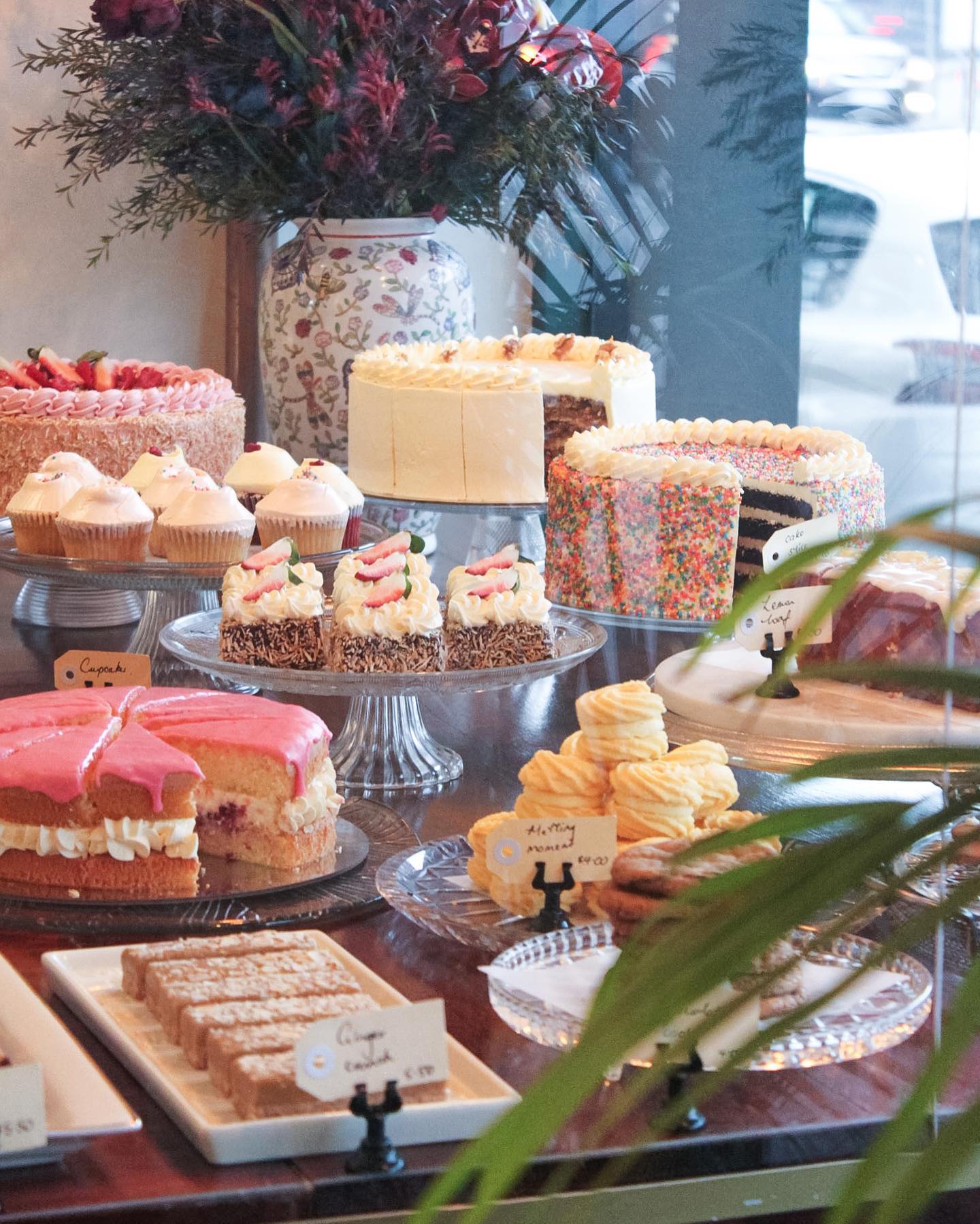 Cakes displayed in the window of Hopetoun Tea Room in Melbourne Stock Photo  - Alamy