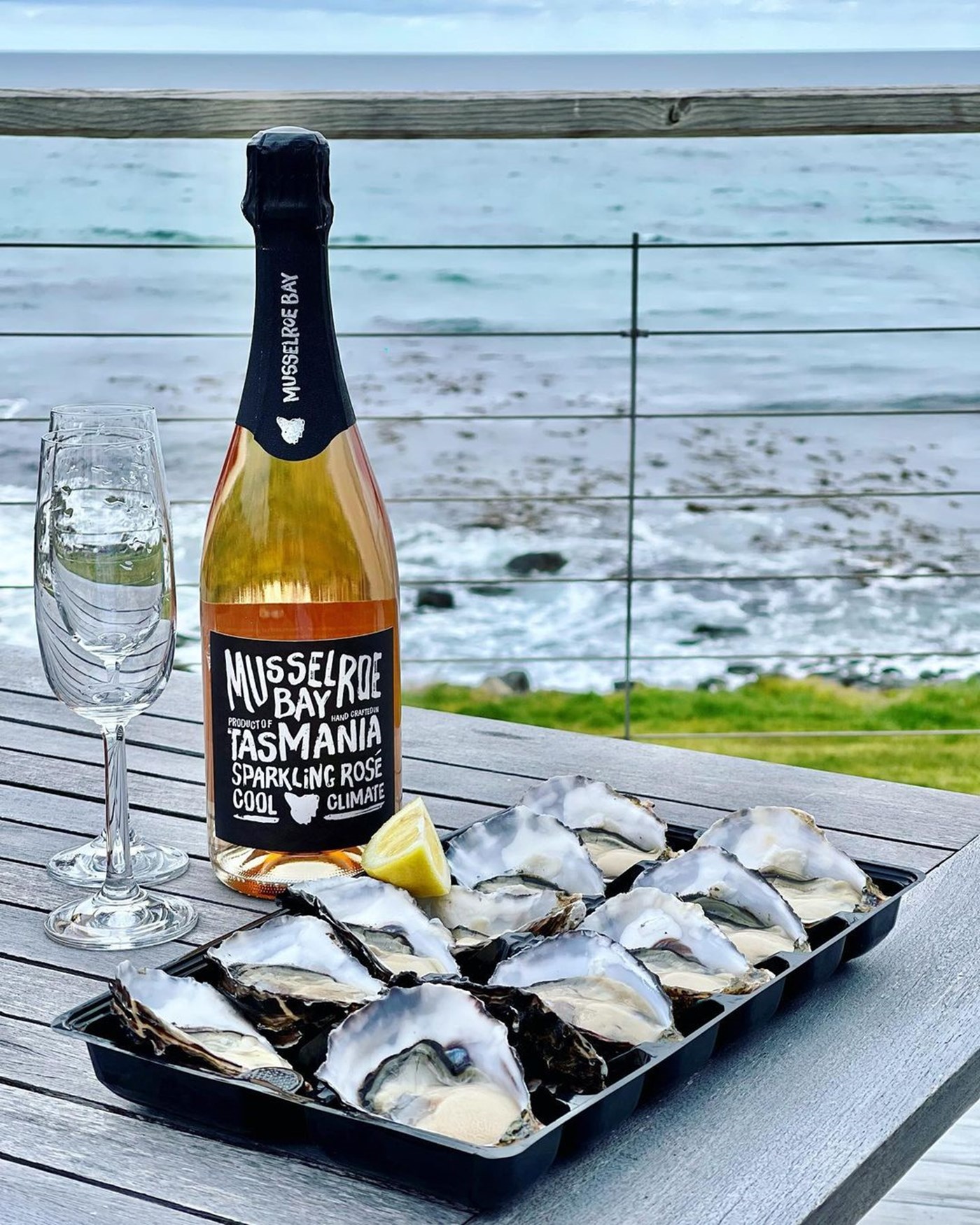 Sparkling Rose and Oysters at Lease 65 in St Helens Tasmania