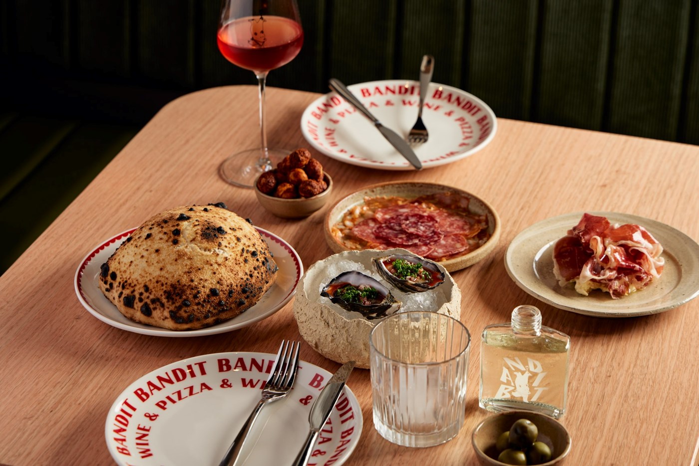 Calzone, oysters and salami at Bandit Pizza and Wine in Adelaide
