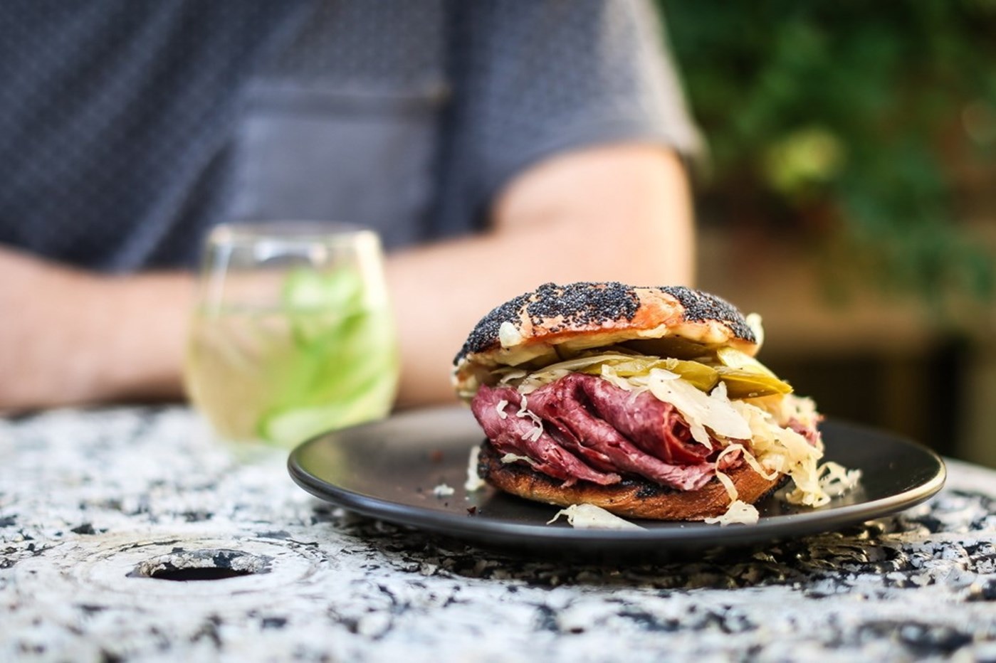 A Reuben Sandwich on a black plate Lox Stock Barrel Bondi Sydney