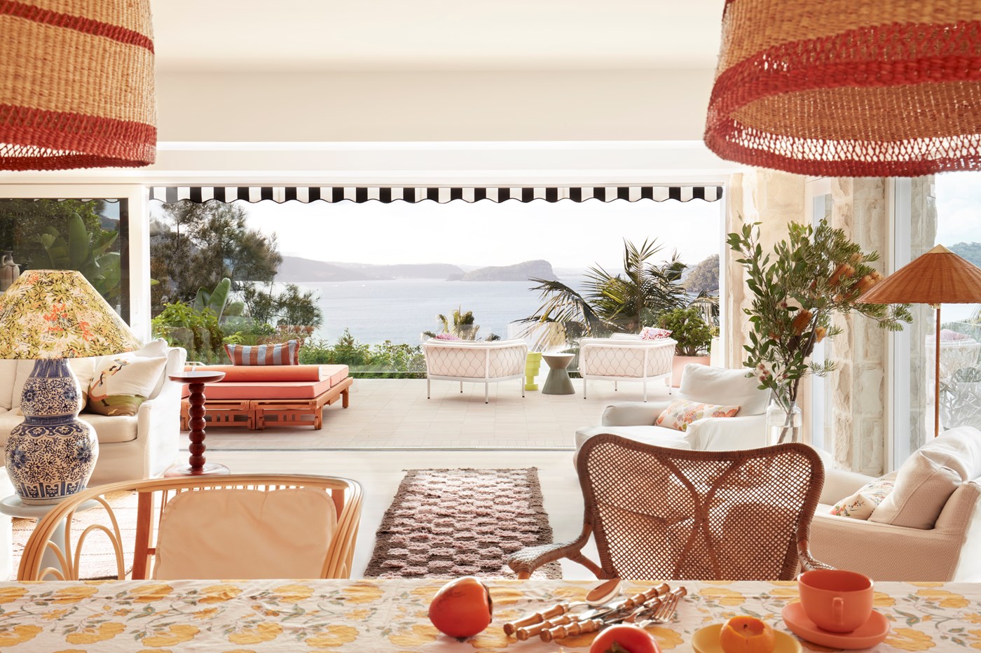 The bright and vibrant living room of La Palma, looking out onto the ocean. 