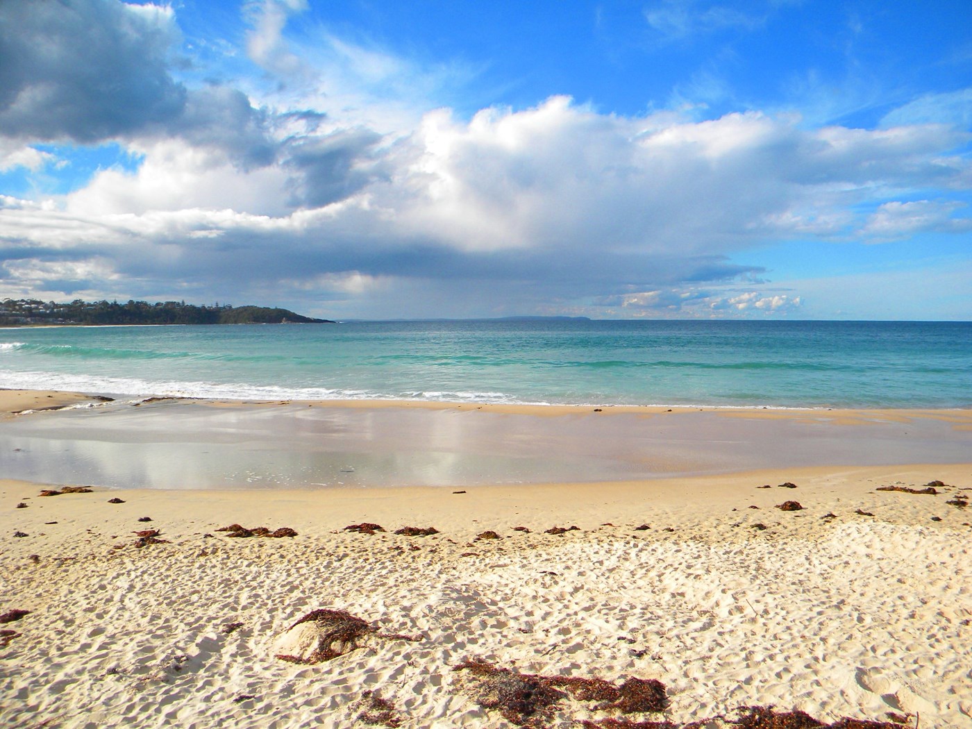 Pristine sand and turquoise water at Mollymook Beach NSW