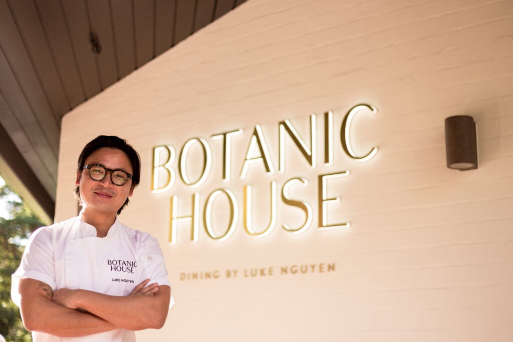 Luke Nguyen stands outside his Botanic House restaurant.