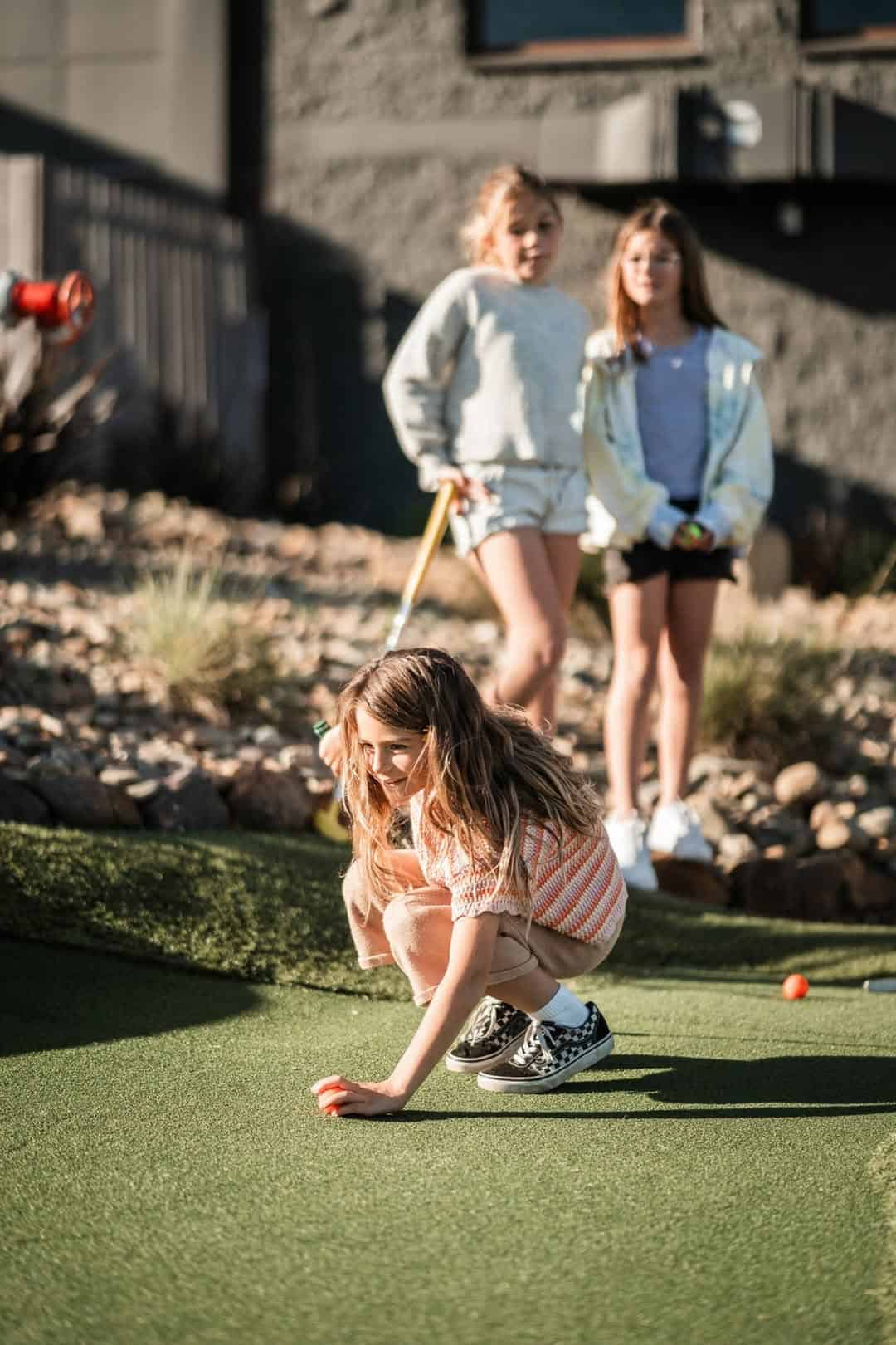 Shanx mini golf adelaide girl on golf course