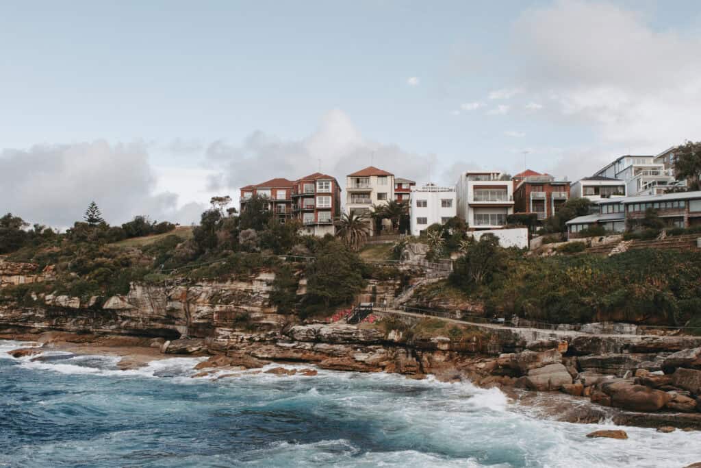 The cliff faces of Coogee framing the ocean.