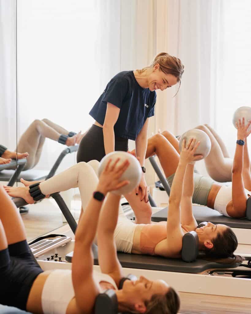 Woman leading Pilates Workout CorePlus