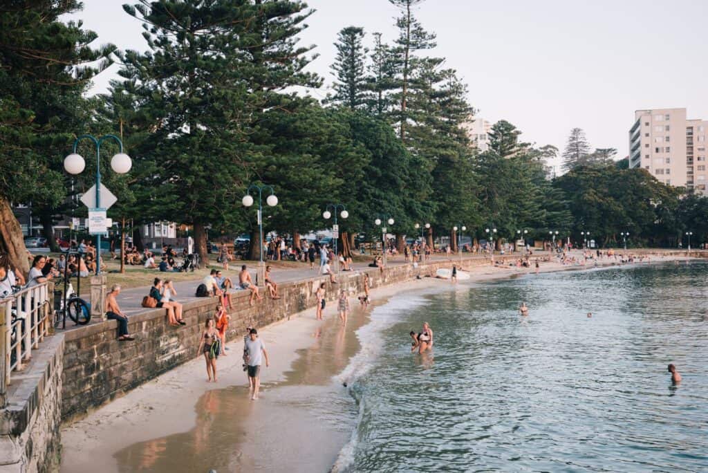 Swimmers flock to Manly Cove for a dip.