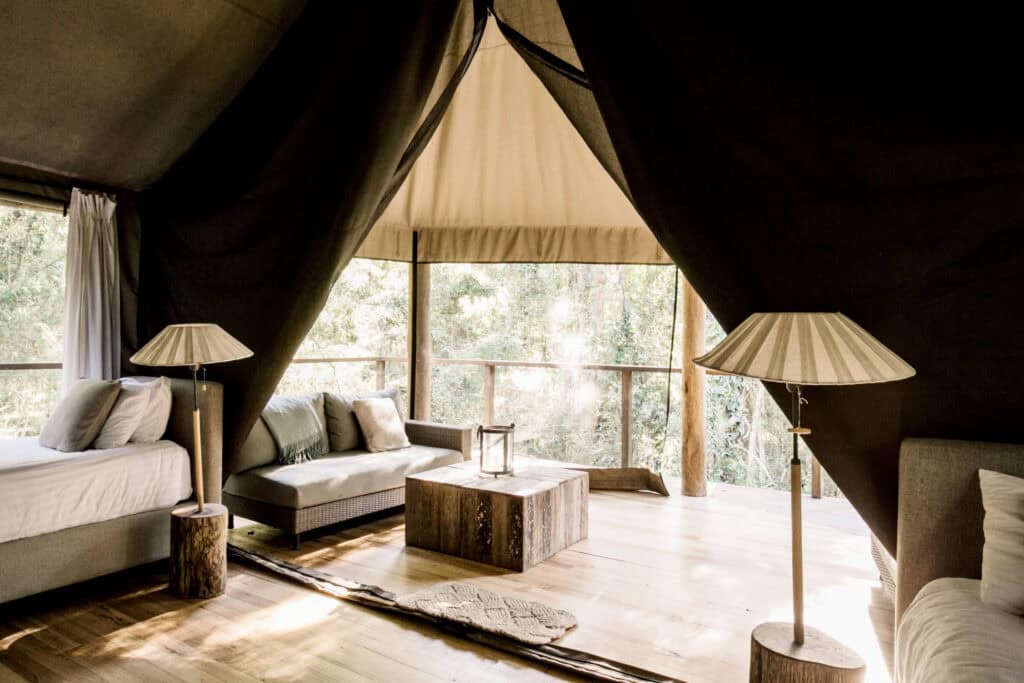 The interior of one of the glamping tents at Paperbark Camp.