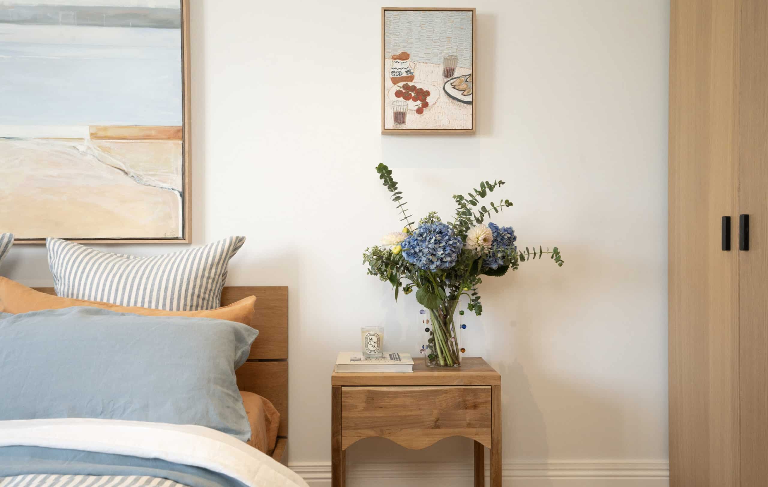 The Audrey Scallop Bedside by McMullin & Co. adds a chic yet fun focal point to any bedroom corner. 
