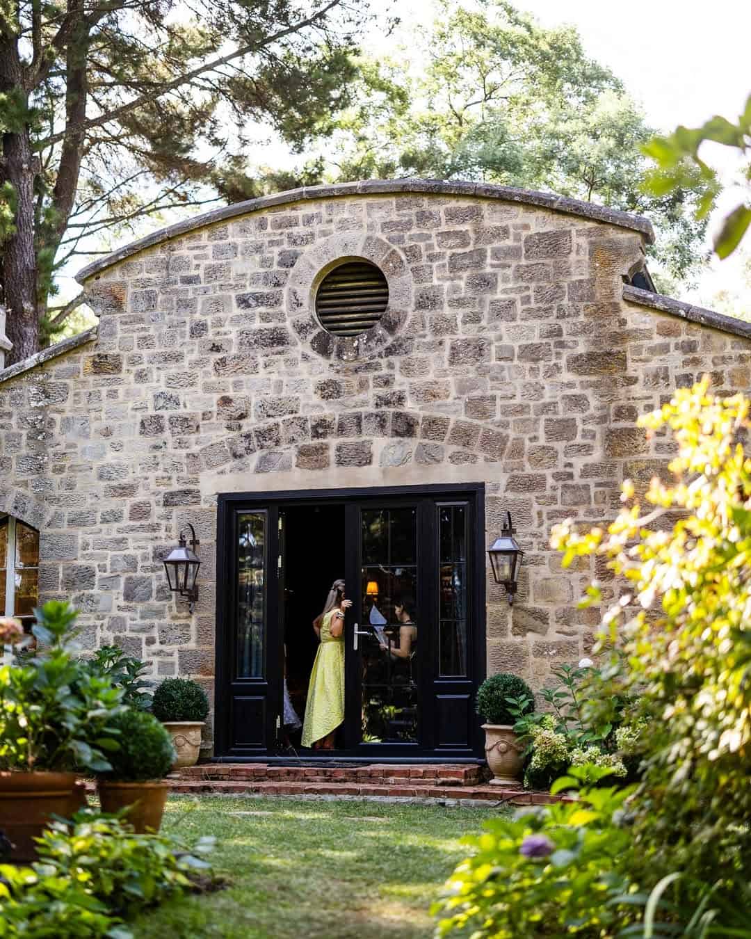 exterior of old stone building at carriage house 1884 adelaide hills