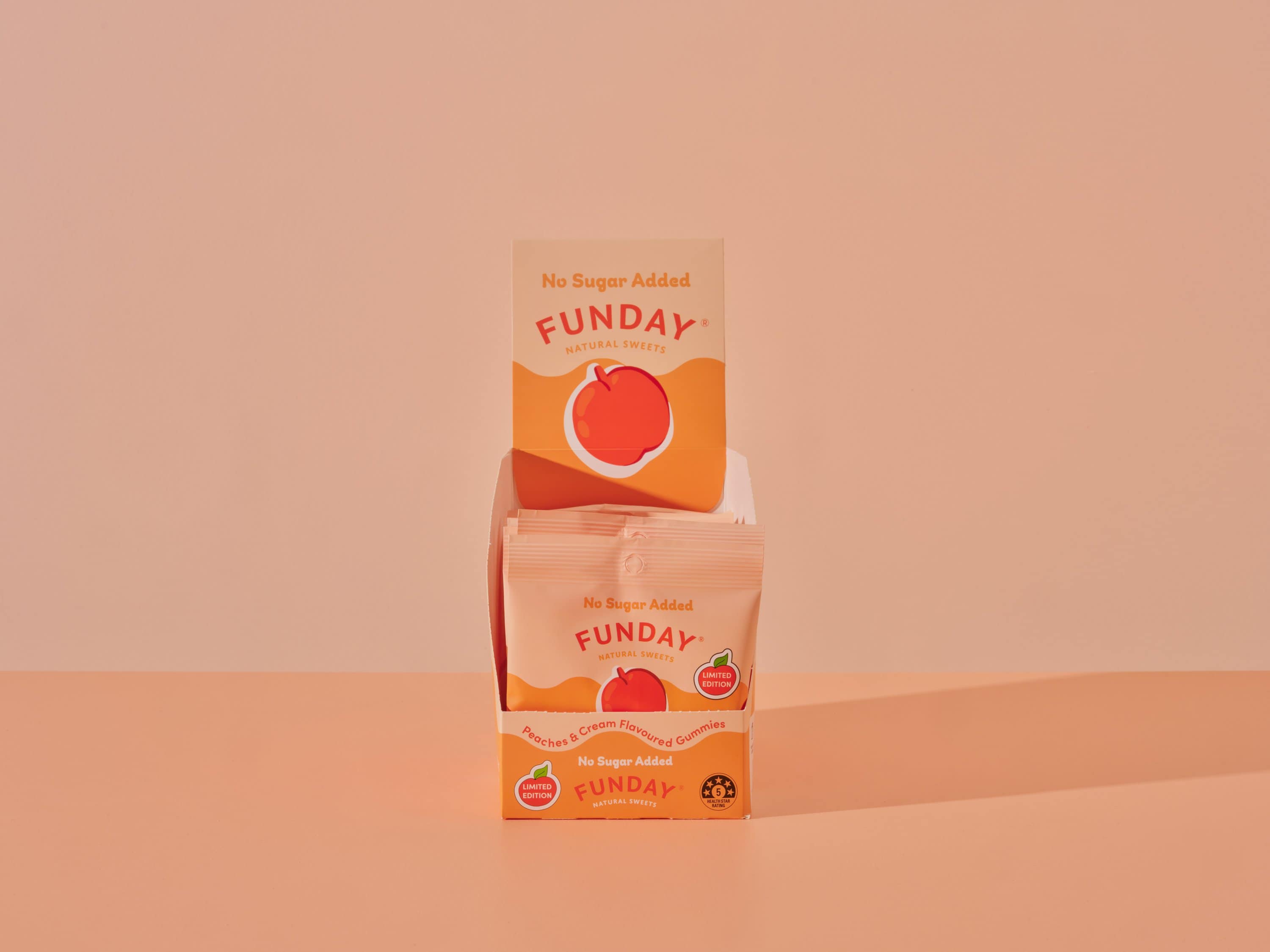 An orange and peach-coloured packet of the Funday Peaches and Cream.