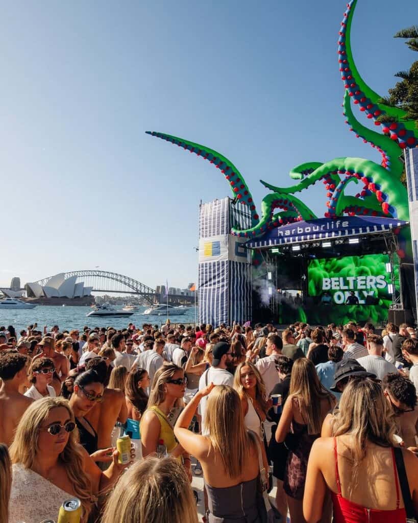 People dance by Sydney Harbour at Harbourlife.