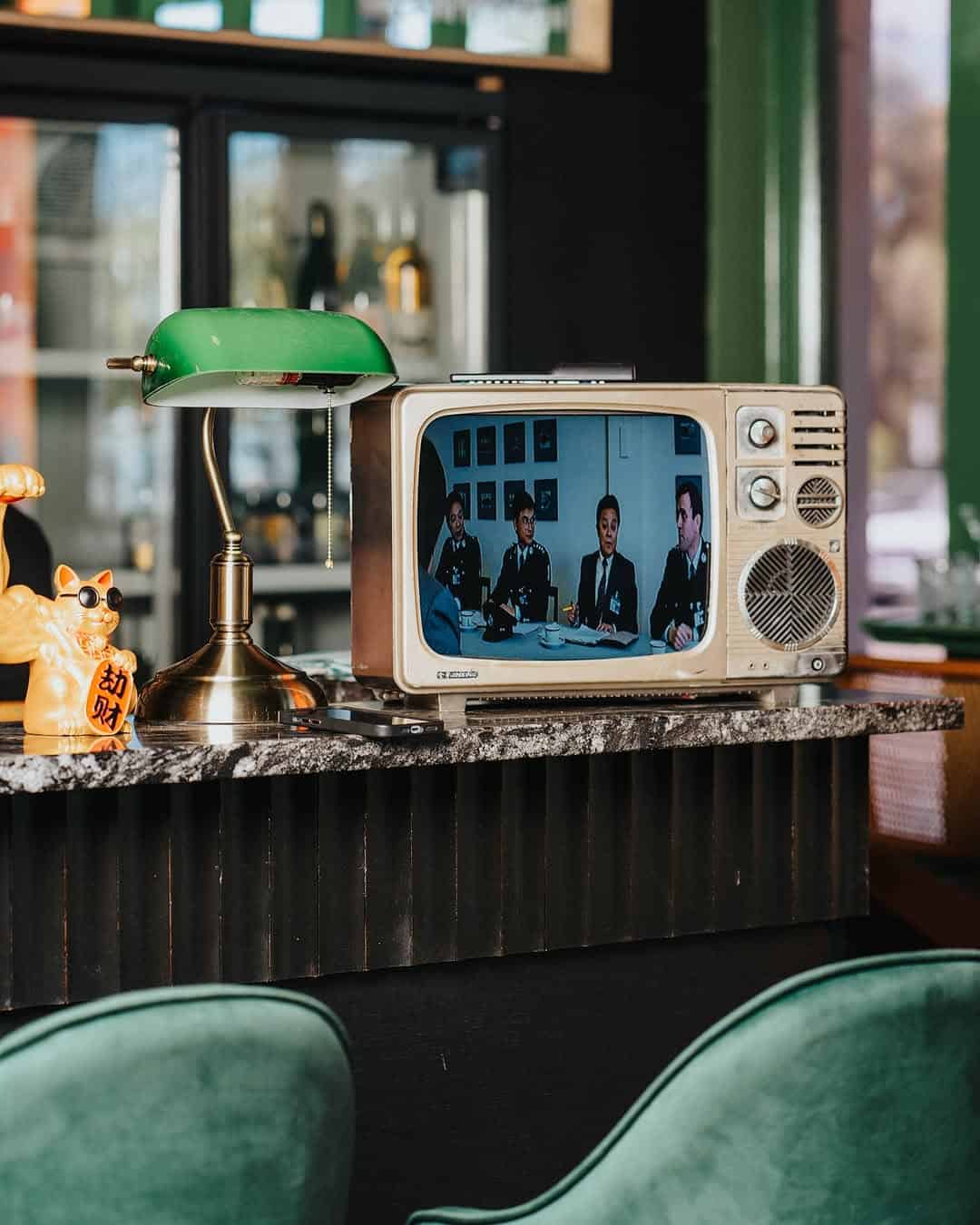 old school tv and desk lamp at monica adelaide