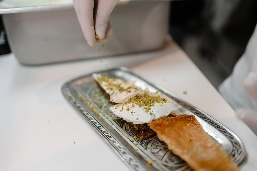 Preparing the Hakiki slice!📍63-71 Enmore Road, Newtown📍1A Railway Parade, Burwood⏰Sun-Thur- 11-30am - 10-30pm⏰Fri-Sat- 11-30am - 11-30pm#desserts #yummy #foodie
