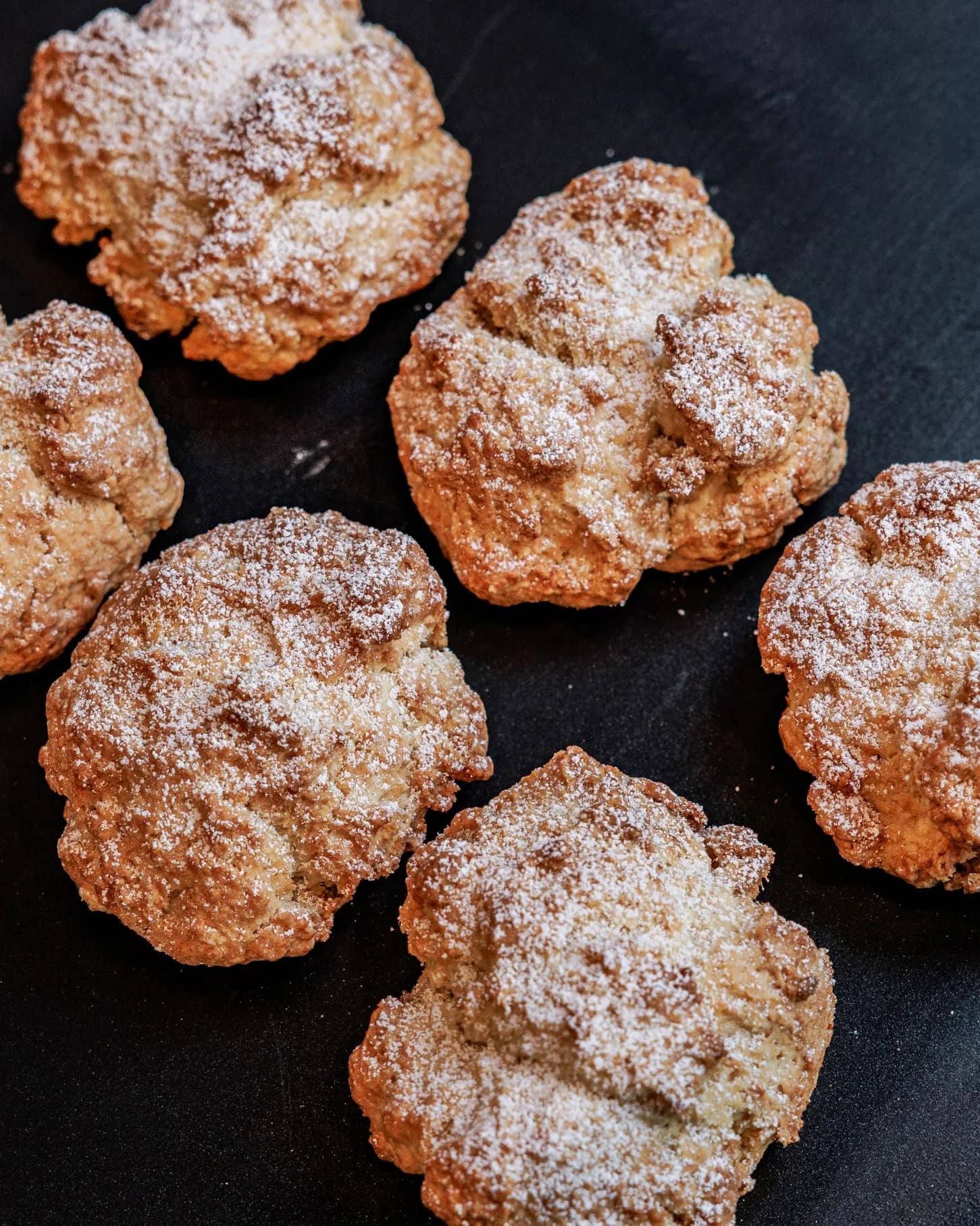 Mini plain scones dusted with icing sugar at Banksia Bakehouse Sydney CBD