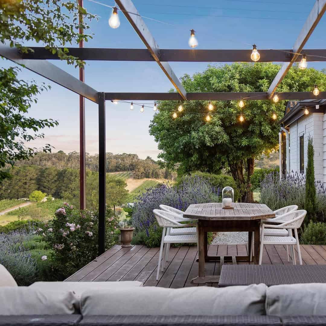 outdoor patio with string lights at ode to the orchard adelaide hills