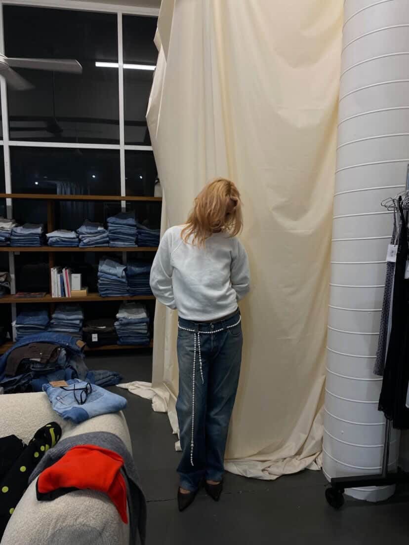 girl posing in vintage jeans