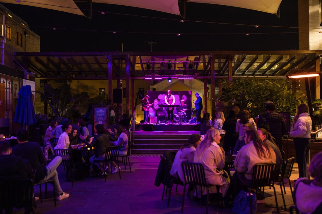 A performer takes the stage at Jazz Sessions in The Rocks.