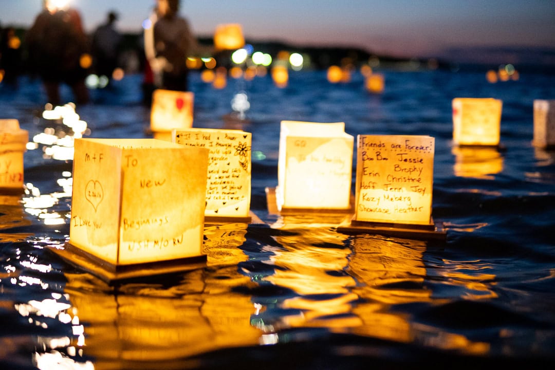 Water lanterns float on water at the Water Lantern Festival