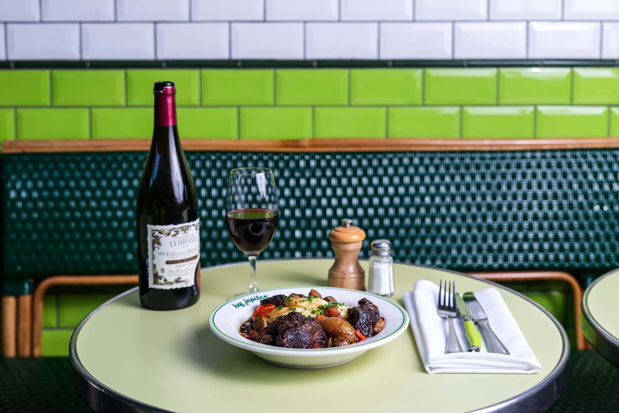 Table set with food and wine at Hey Jupiter in Adelaide.