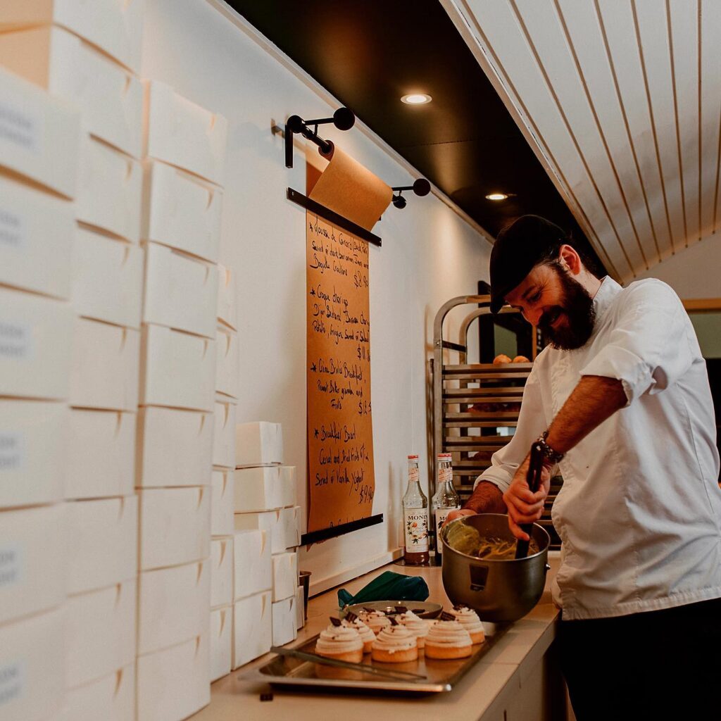 Chef baking pastries at Maison Clement in Adelaide.