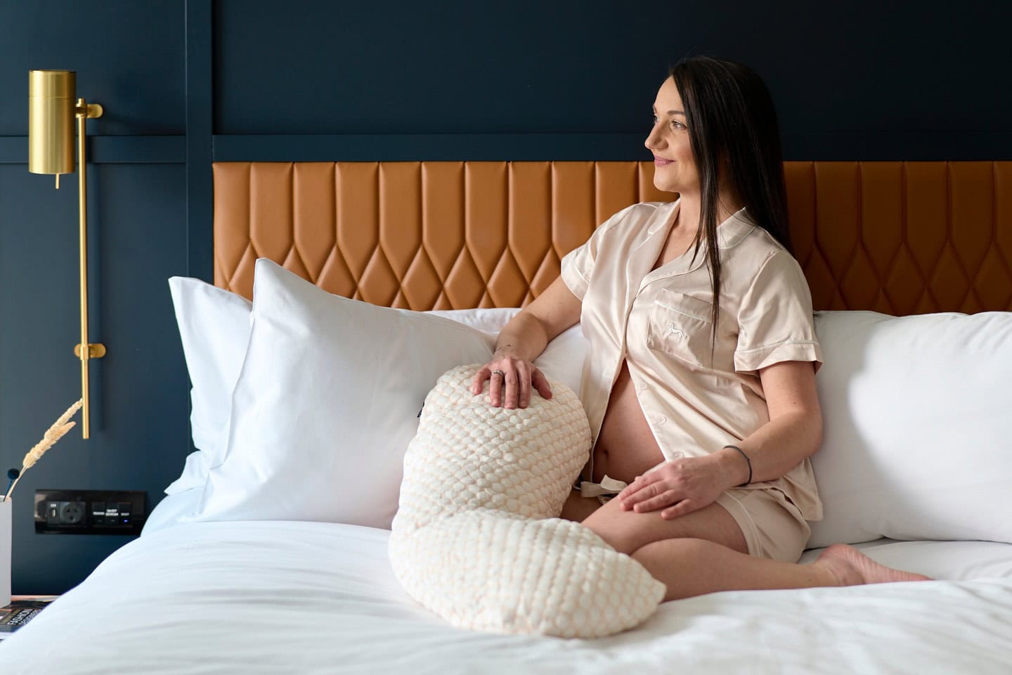 Executive room at Dorsett Melbourne with Sleepybelly maternity pillow for a CBD babymoon stay in Melbourne.