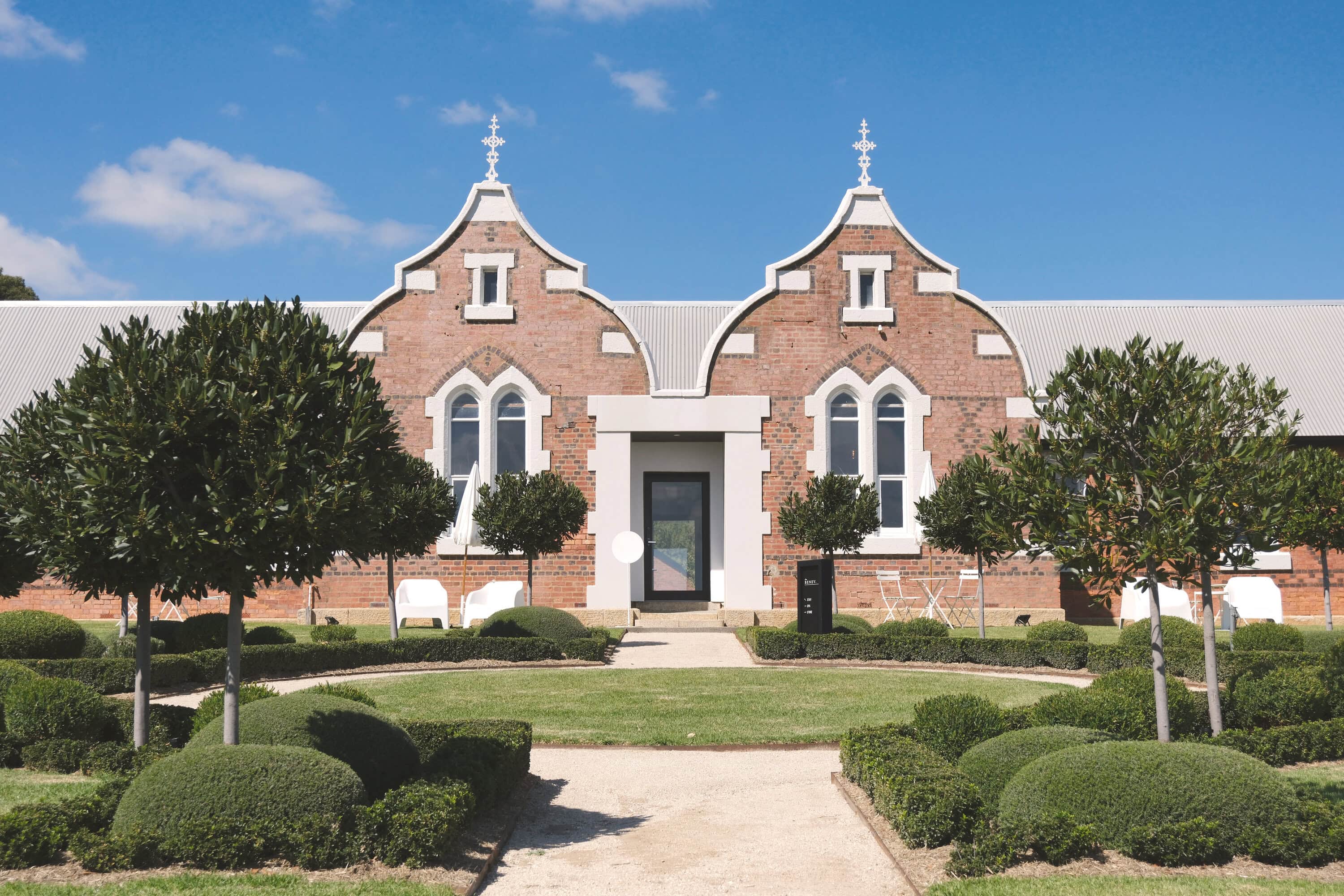 The Benev in Beechworth with stone bath and fireplace for a High Country babymoon in Victoria.
