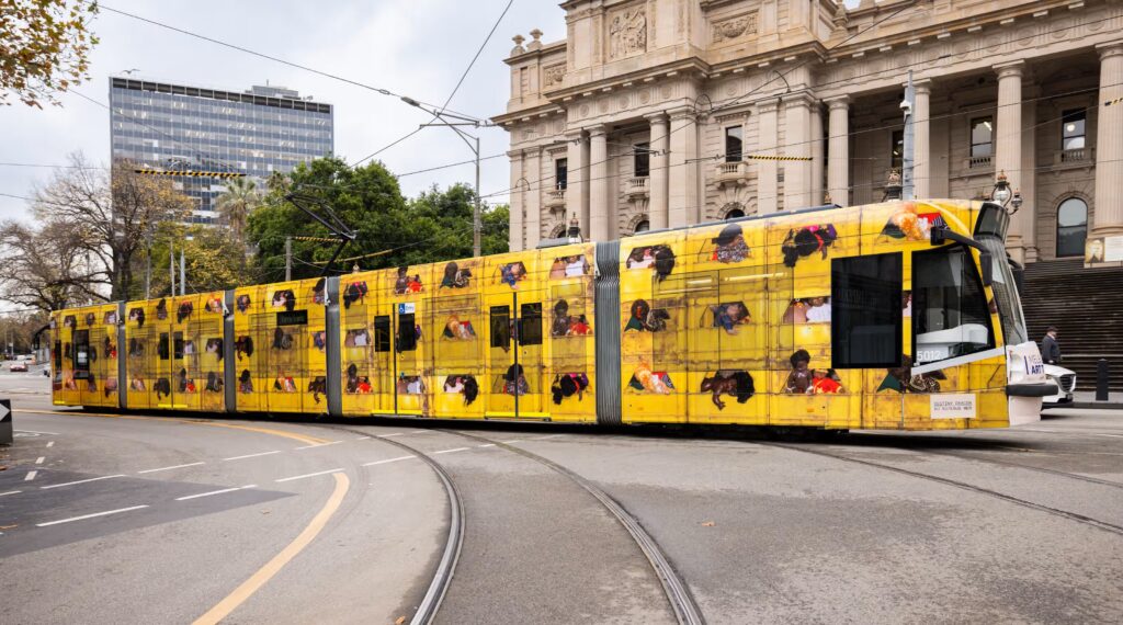  Yellow Melbourne tram featuring First Peoples artwork for Blak Art on the Move at RISING.