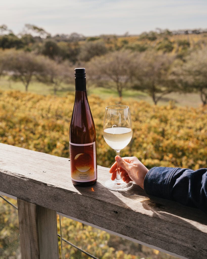 A glass of the Aura Biodynamic Skin Contact Gewürztraminer at Cape Jaffa Wines in South Australia.