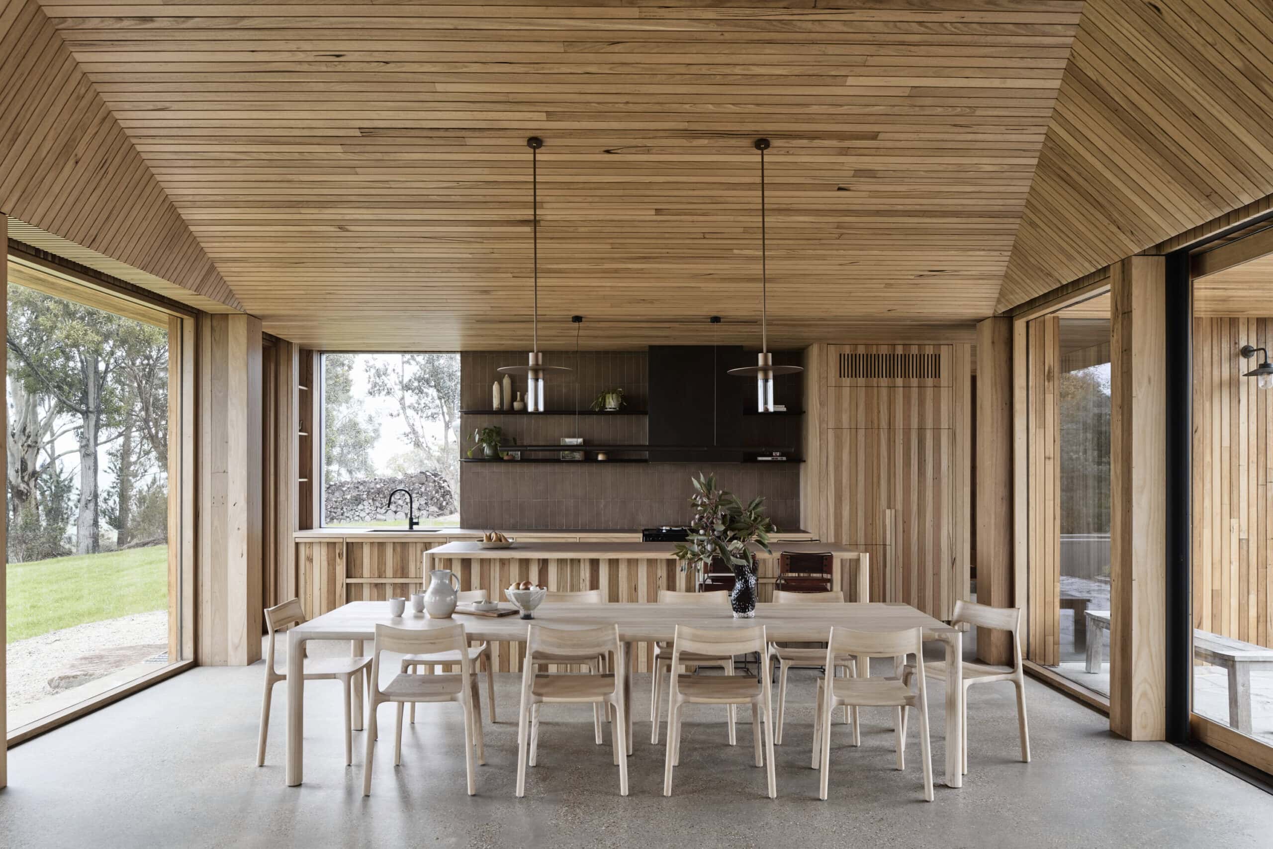 The dining room is open to the outside and has a wooden ceiling
