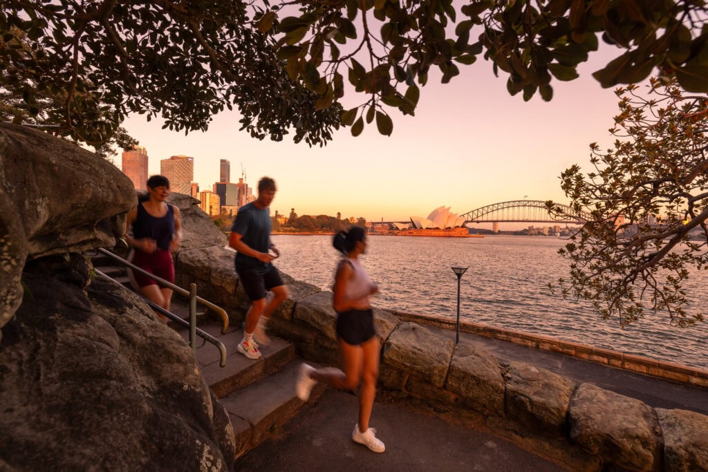 running along Sydney Harbour at sunrise