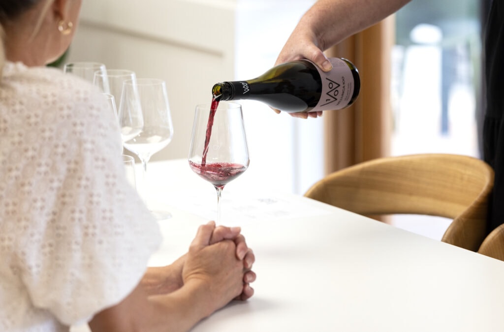 Pouring glass of Willunga 100 Grenache in South Australia.