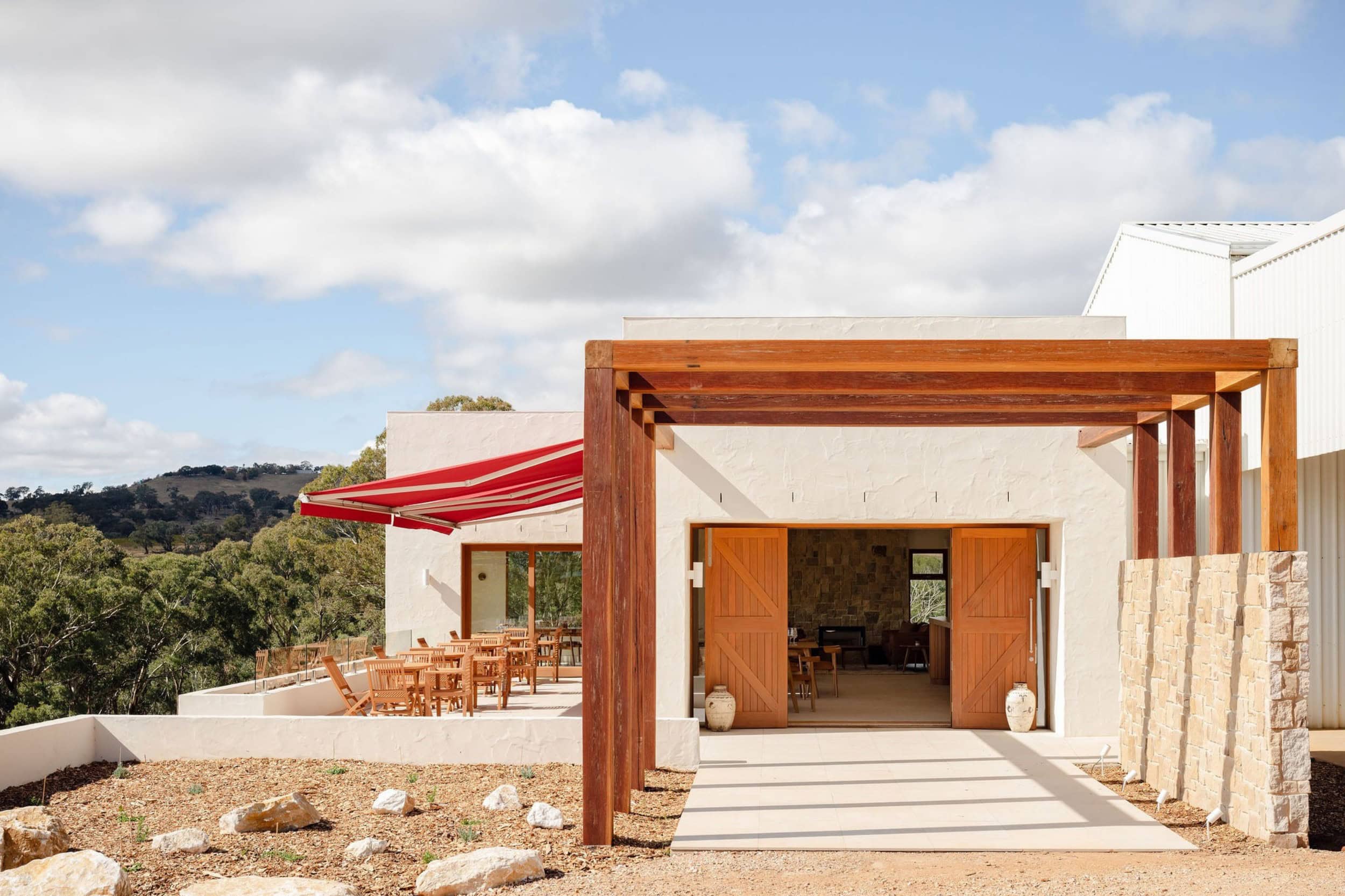 Canobolas Wines cellar door exterior entrance with timber pergola sandstone walls and outdoor tasting terrace Orange NSW
