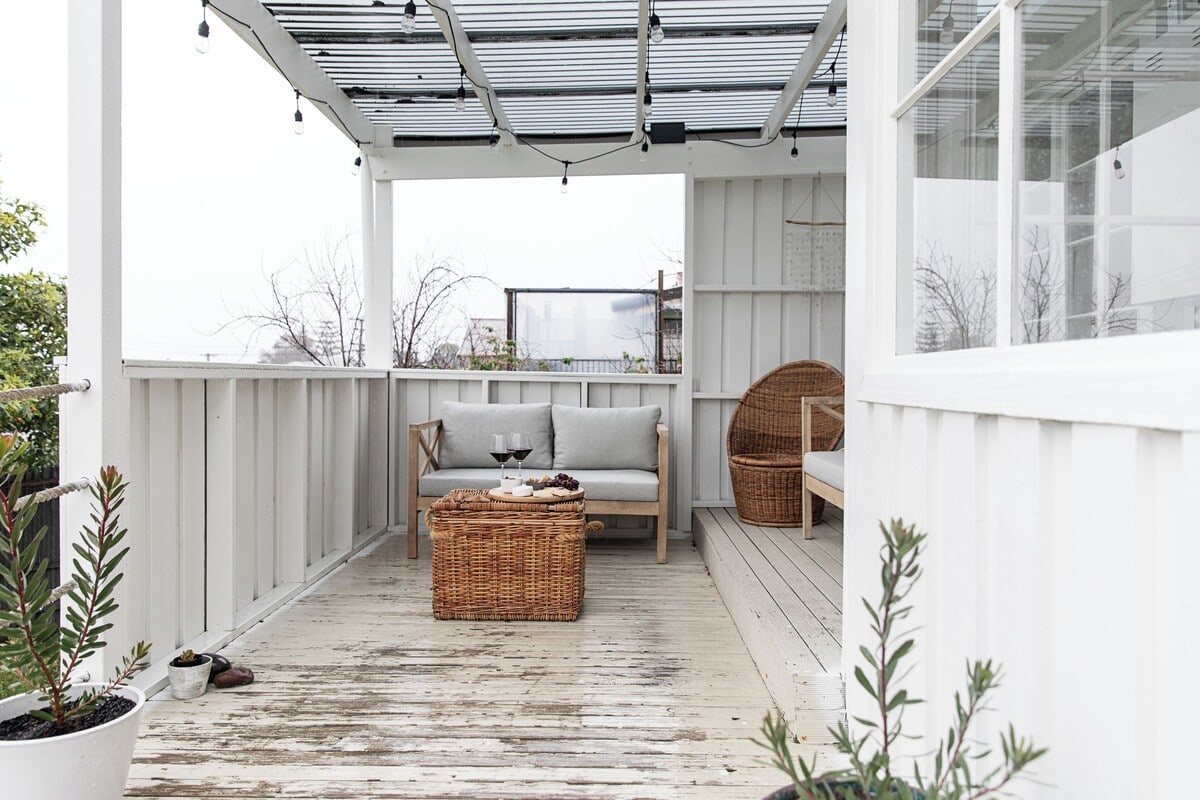 saltwood terrace outdoor deck with cheese plate and wine an accommodation in bridport tasmania