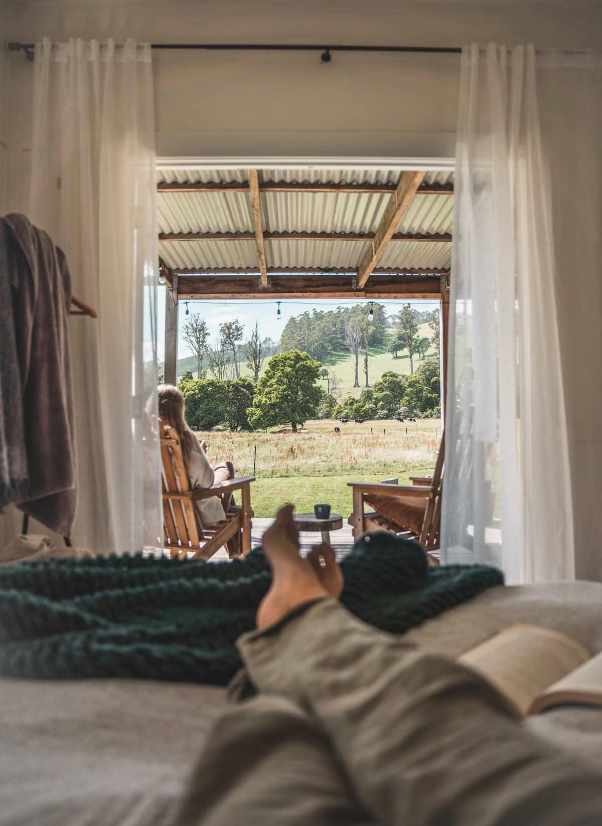 sawmillers cottage tasmania view from the bedroom out onto farmland