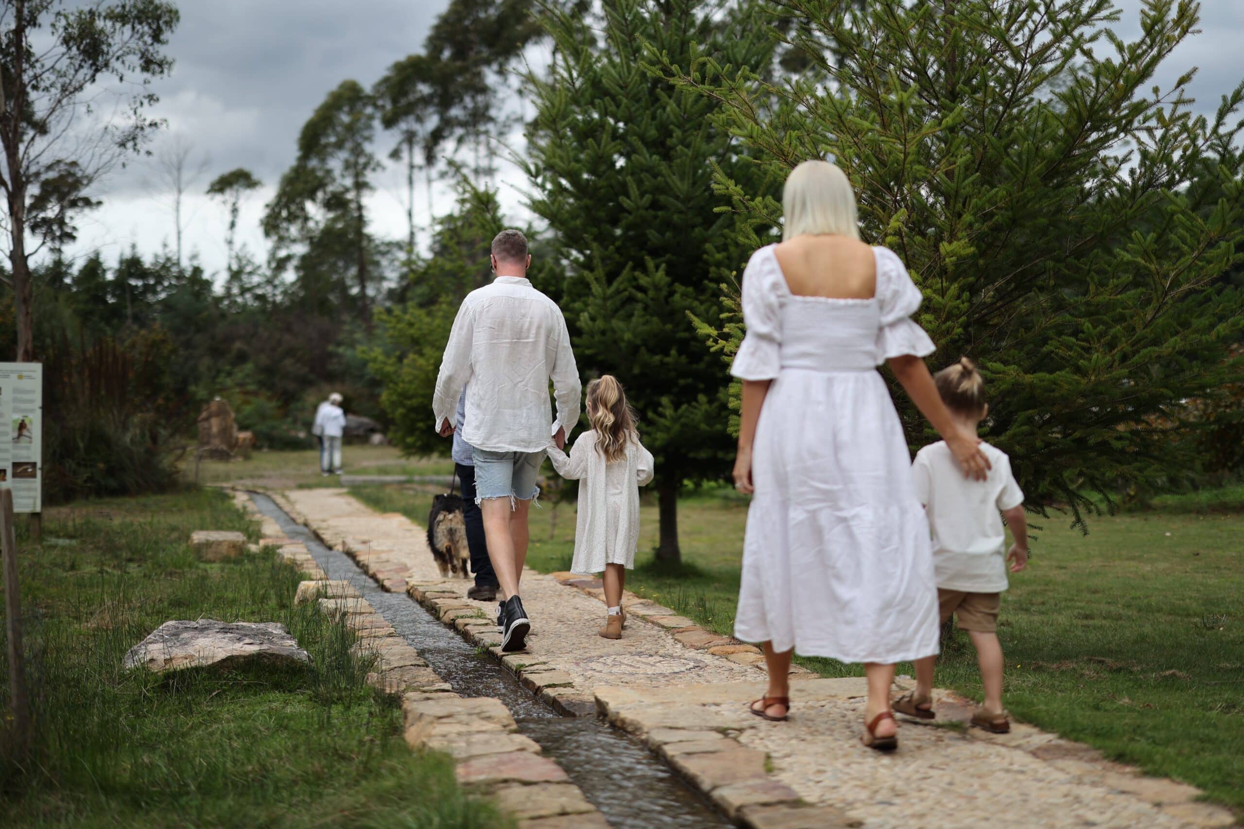 a family walking along a path at 41 degrees south deloraine tasmania