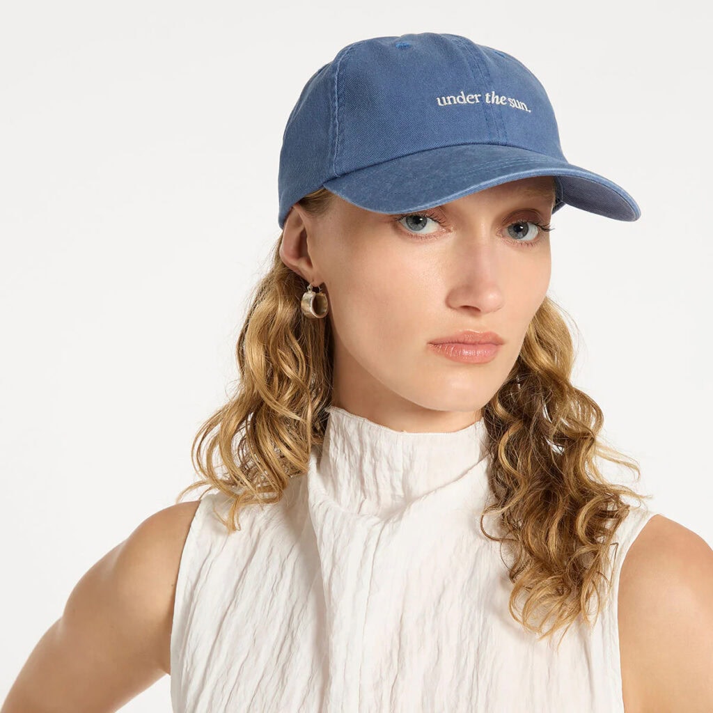 Status Anxiety Under the Sun Cap