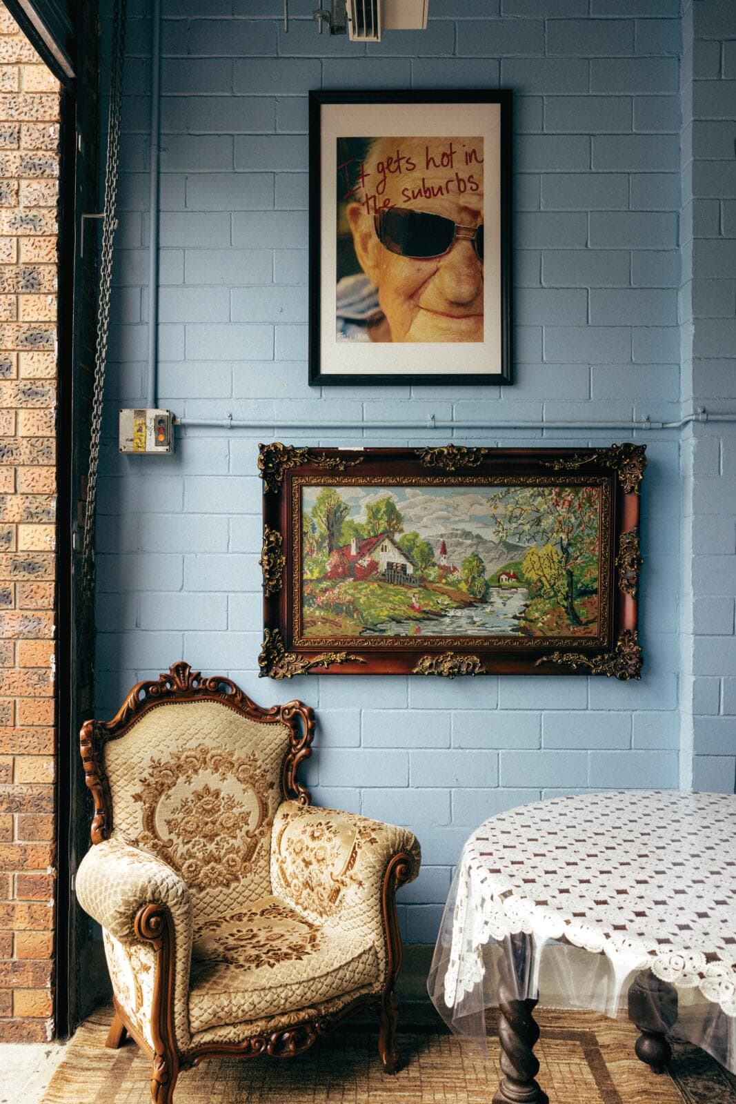 Babas Place interior vintage armchair and eclectic wall art Marrickville Sydney