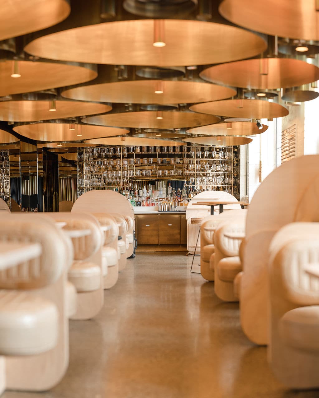 Interior of Elchi on Flinders Street in Melbourne, with elegant dining tables, heritage architecture and a modern Indian restaurant setting.