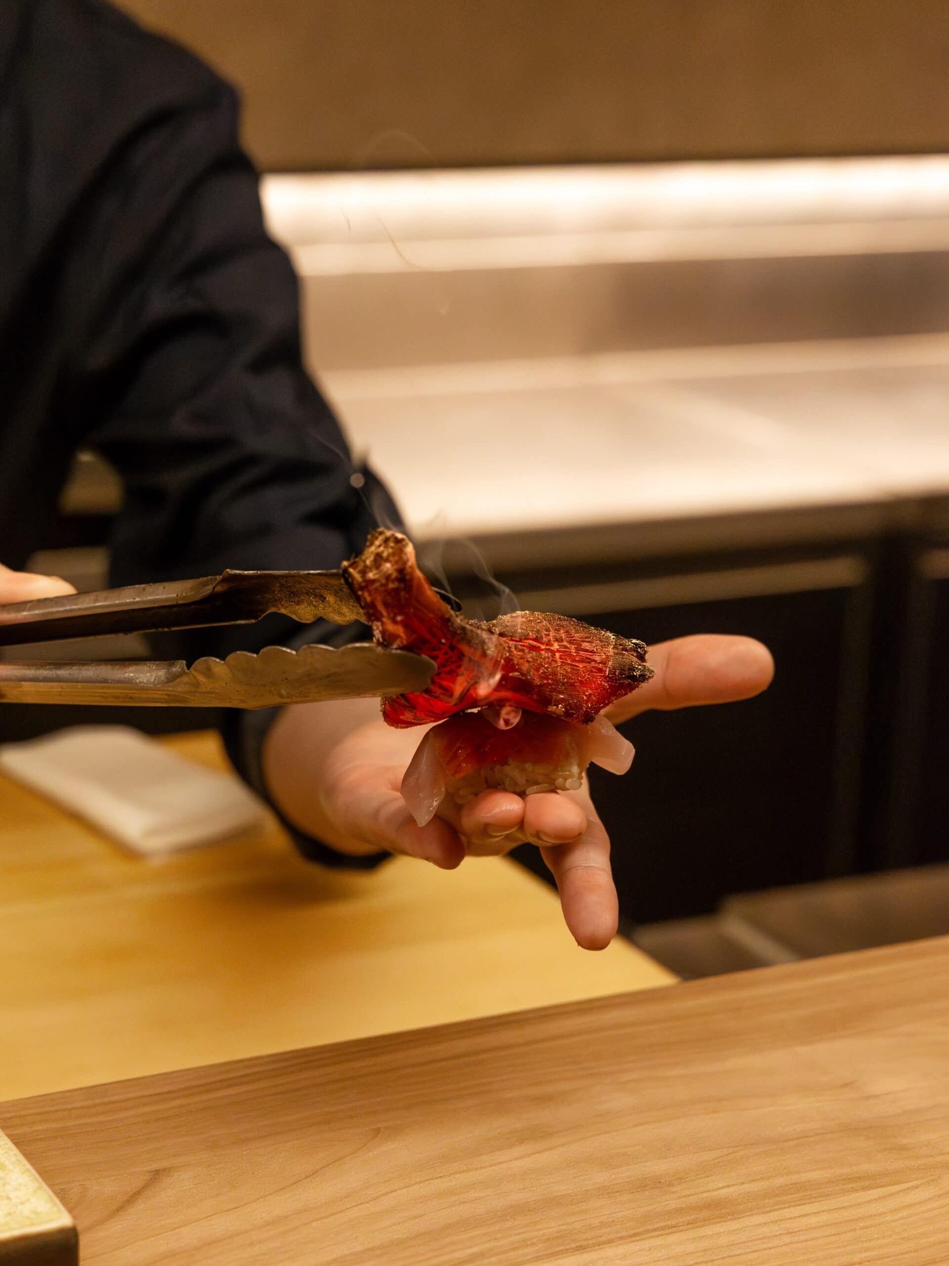 scorched sashimi at the omakase counter at Kentaro in Melbourne