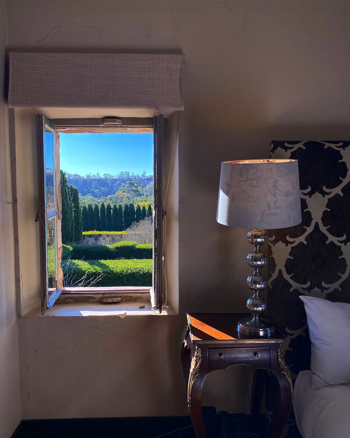 Heritage-listed Villa Parma in Hepburn Springs, a Swiss-Italian luxury stay with Italian marble ensuites and a private garden.