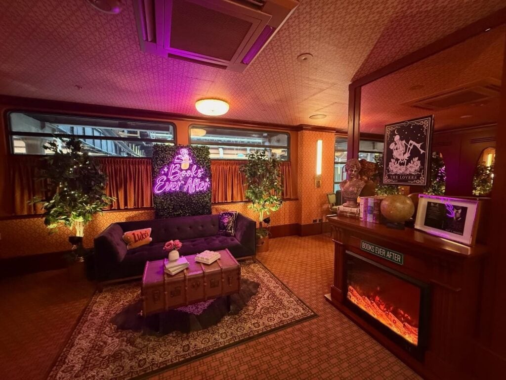 Books Ever After romance bookshop lounge with neon sign at The Grounds South Eveleigh Sydney