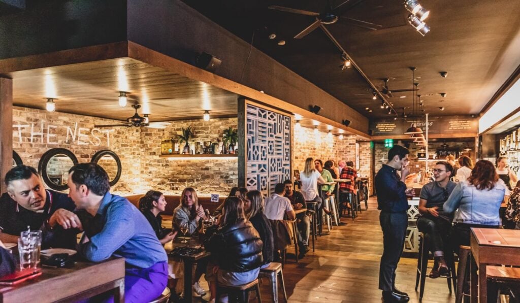 Busy bar interior with patrons on trivia night at The Stoned Crow Crows Nest Sydney