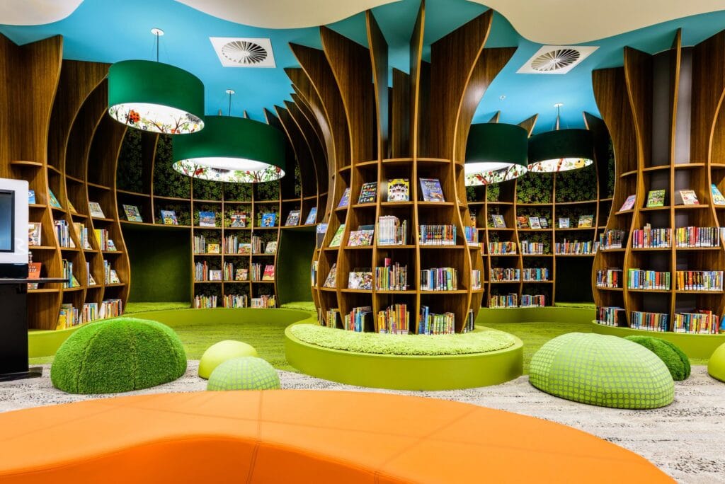 Forest-themed children's reading area with tree-shaped bookshelves at Rockdale Library Rockdale Sydney