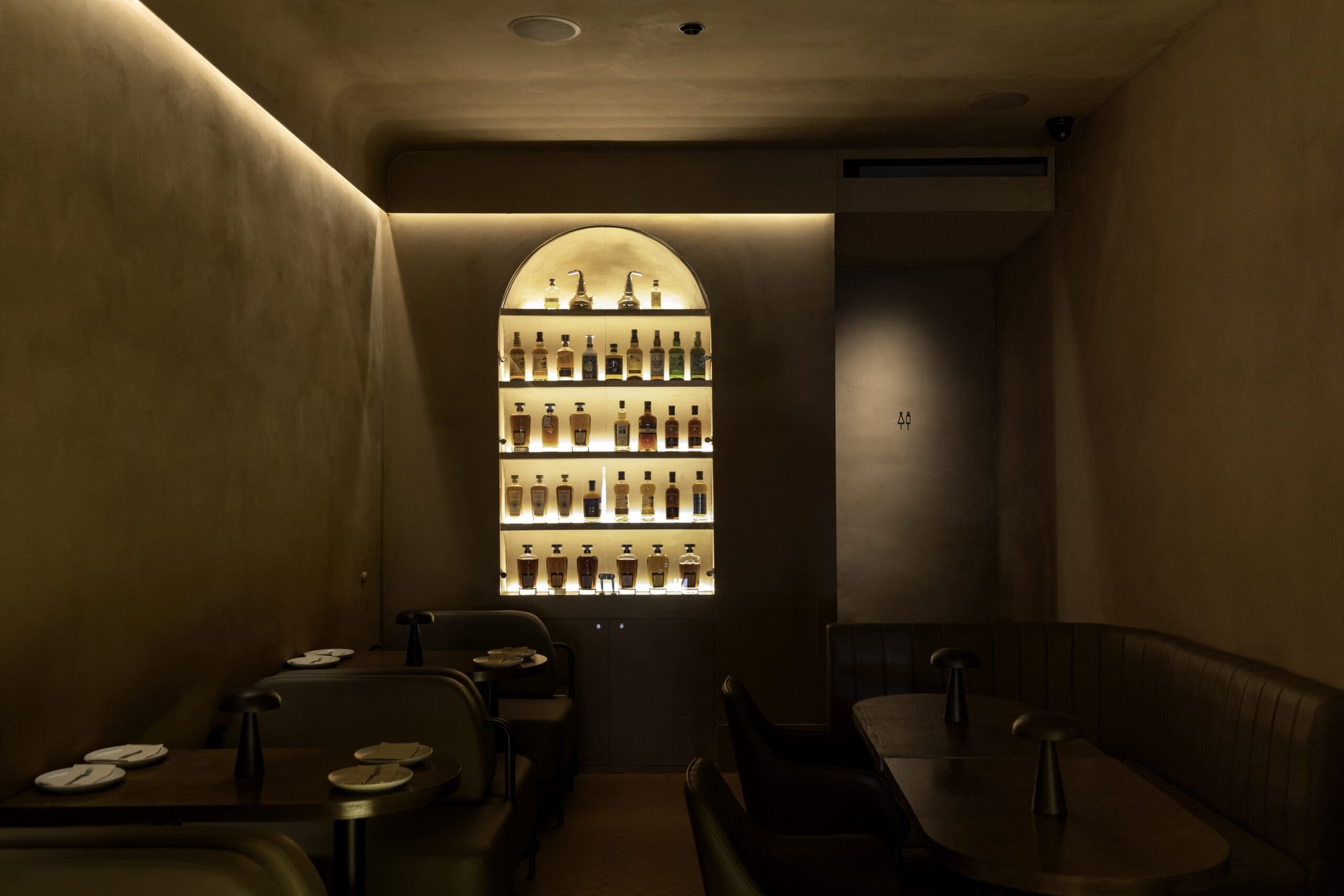 Whisky shelf and dining nook at The Captain's Balcony Crows Nest Sydney