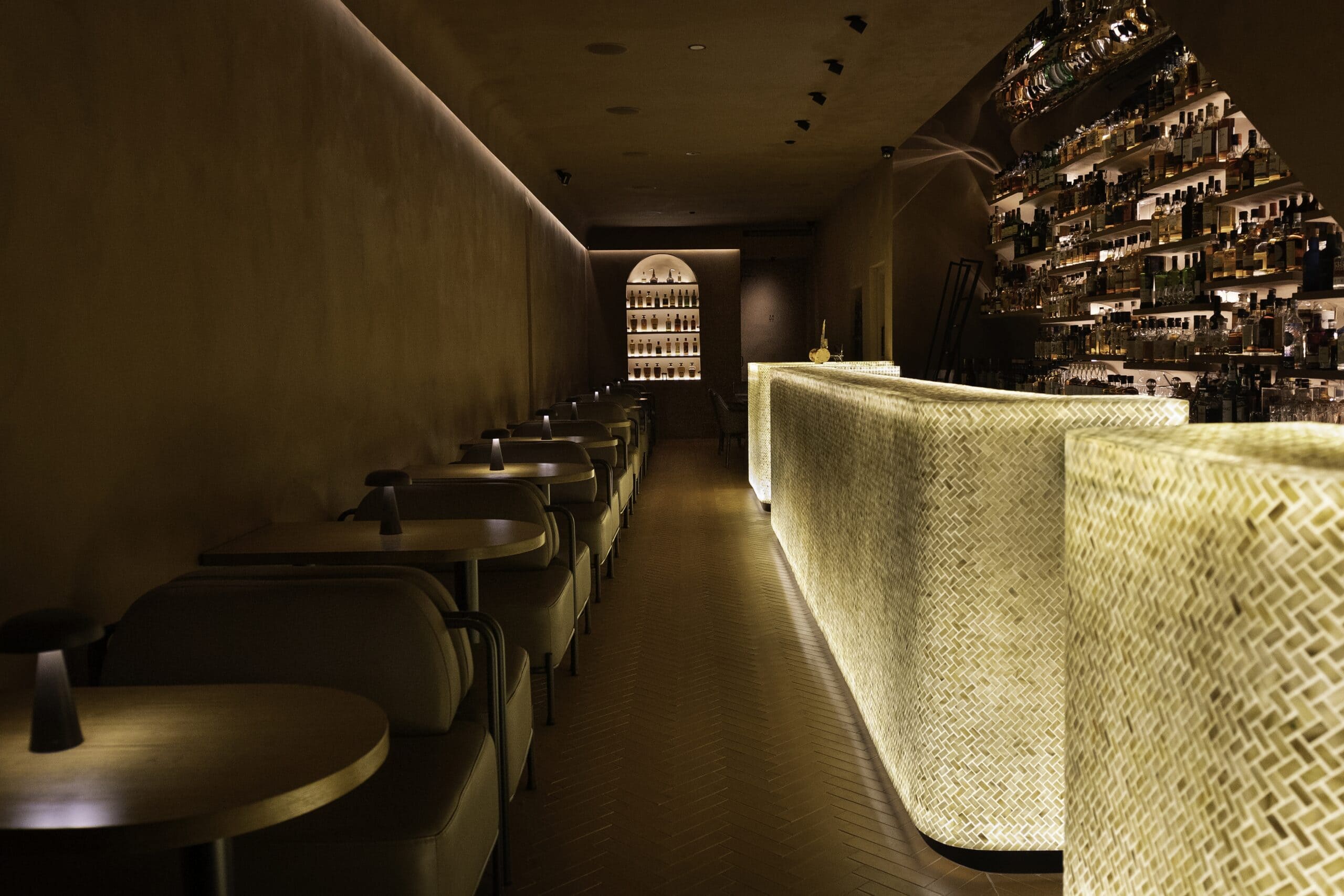 Woven bar counter and whisky wall at The Captain's Balcony Crows Nest Sydney