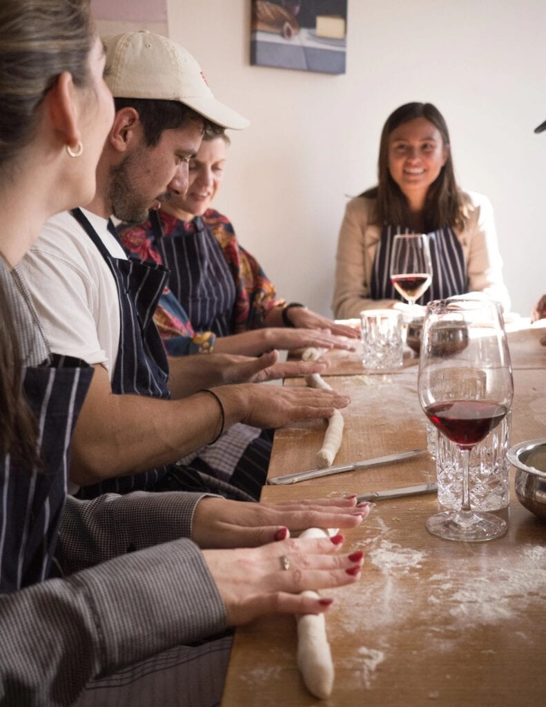Group hand-rolling pasta dough at Italian cooking class I Maccheroni Woollahra Sydney