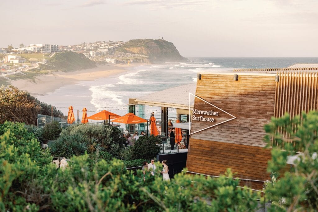Merewether Surfhouse signage and beachfront terrace overlooking the ocean, Newcastle