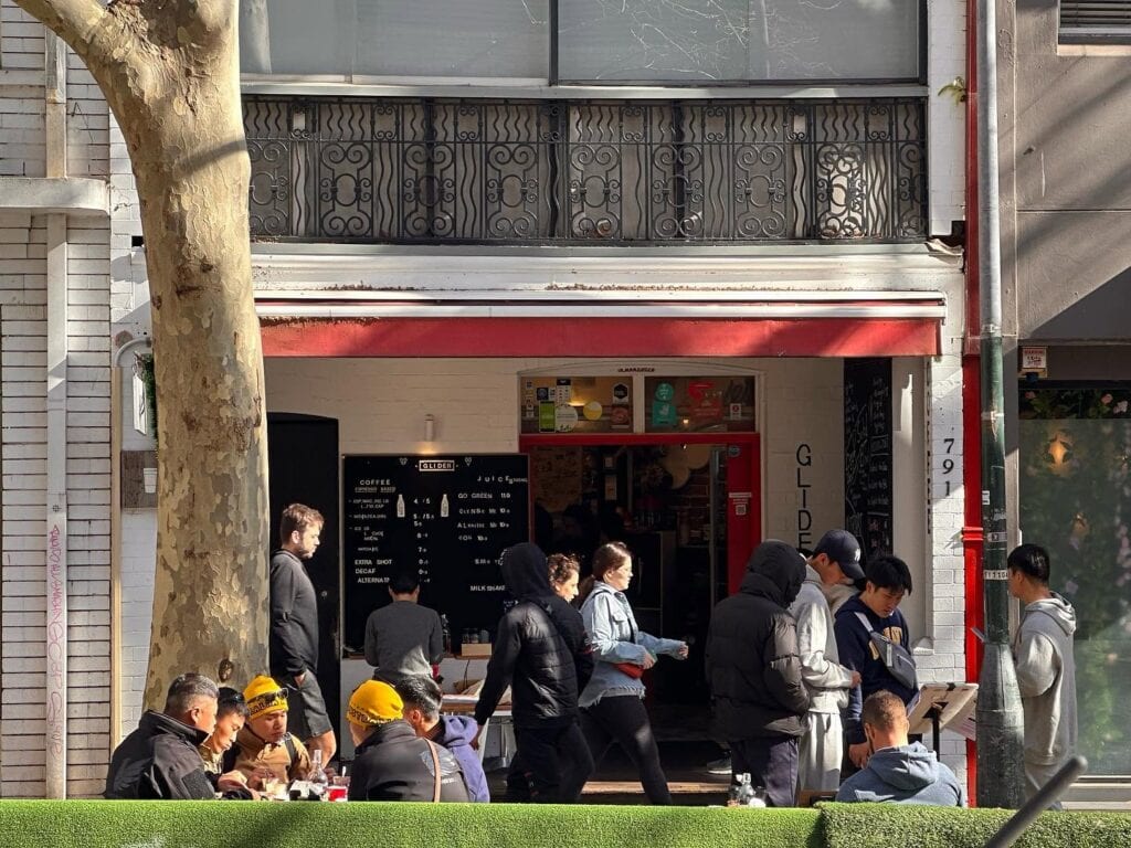 Shopfront exterior with outdoor diners at Glider Cafe Potts Point Sydney