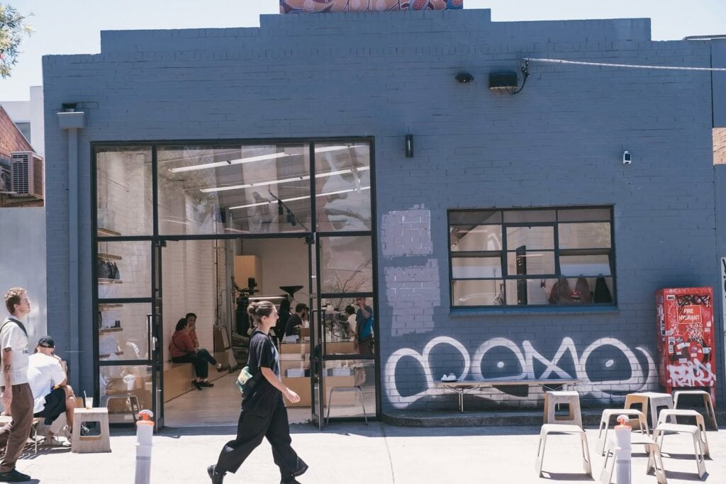 acoffee collingwood facade with person walking past